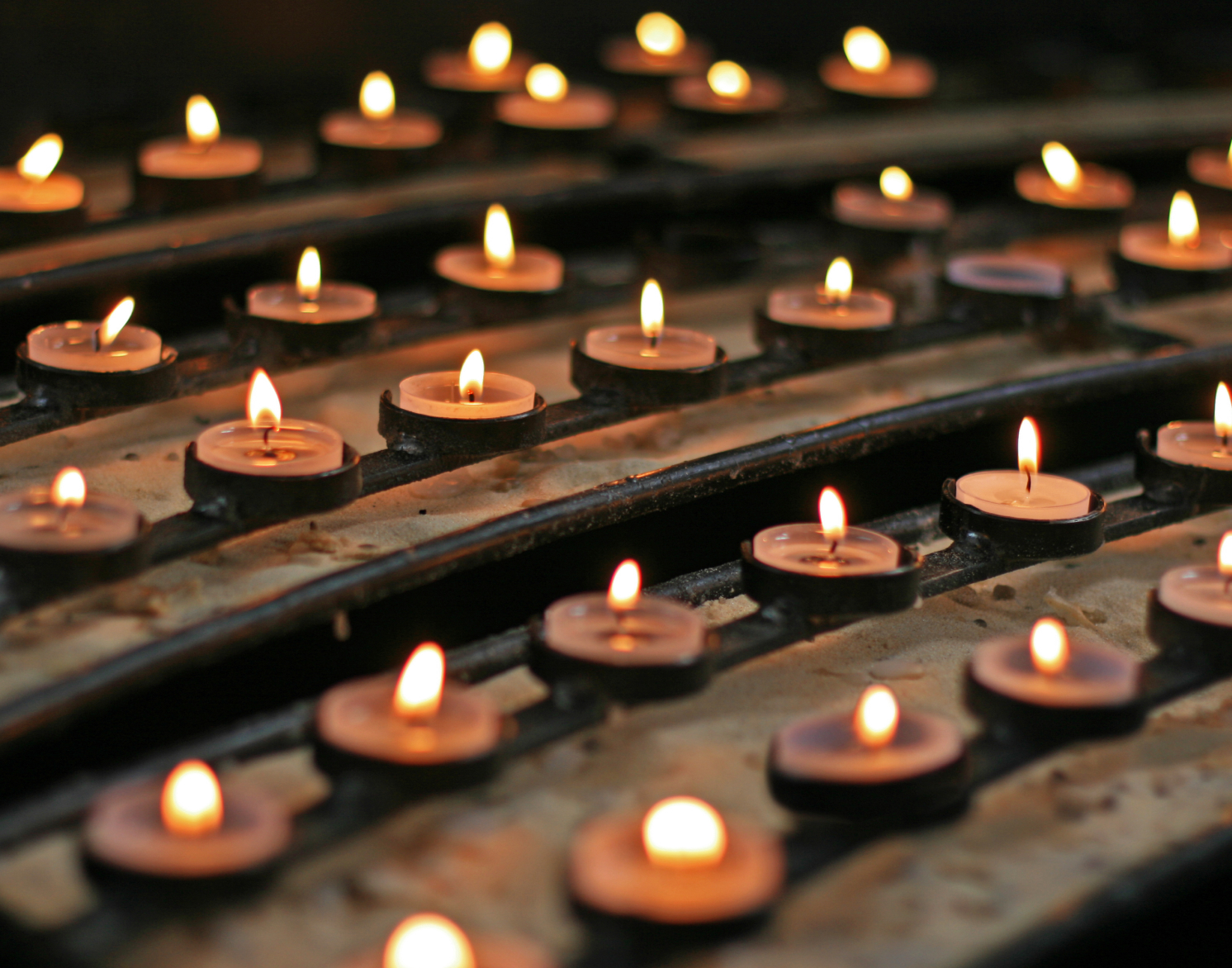 Candles lit in a Catholic church